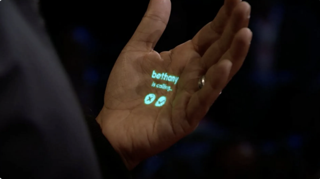 由Apple前軟體工程總監Bethany Bongiorno和創意總監Imran Chaudhri創辦的Humane，於11月9日正式發表了個人AI裝置Ai Pin，以投影的方式將人類的手掌變成手機。ˇ